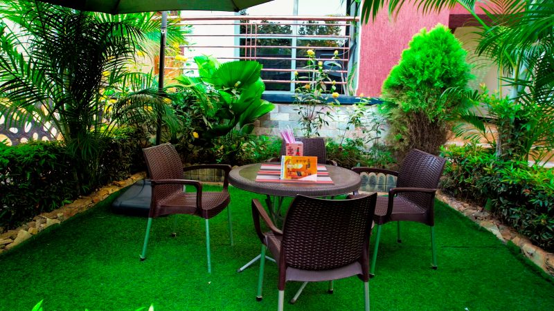 Garden seating in the grounds at Belle Vie Courts Hotel
