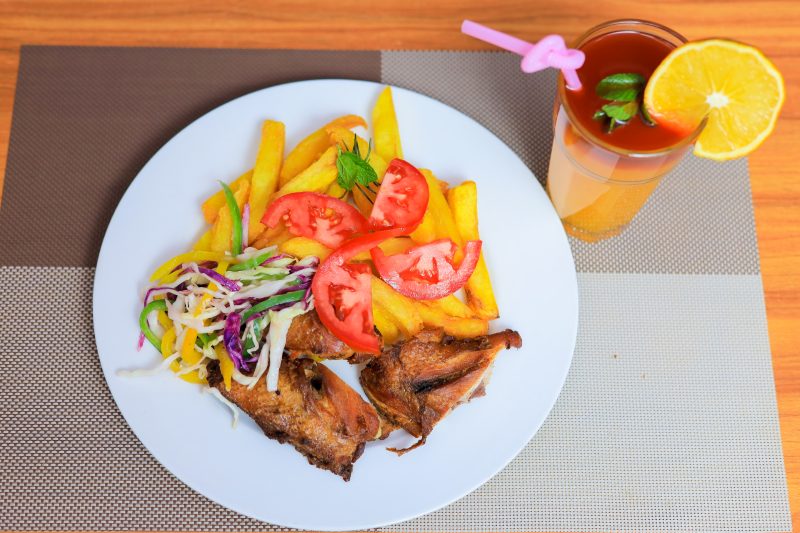 Grilled chicken with chips and salad