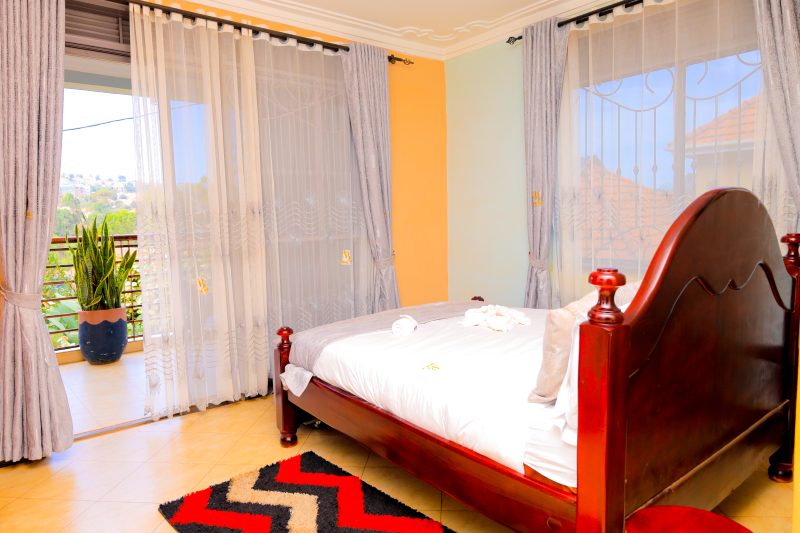 Sunlit guest room with garden view
