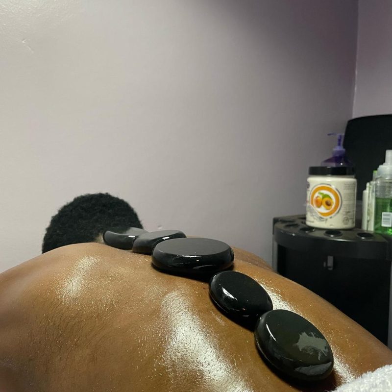 Hot stone massage treatment at Belle Vie Courts Hotel